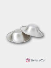 Pair of Silverette nursing cups made from 925 sterling silver, shown on a light grey background