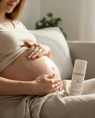 Pregnant mum applying Silverette Stretch Marks Cream to her bump