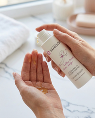 Silverette Cleansing Oil pumped into the palm, showing its light texture