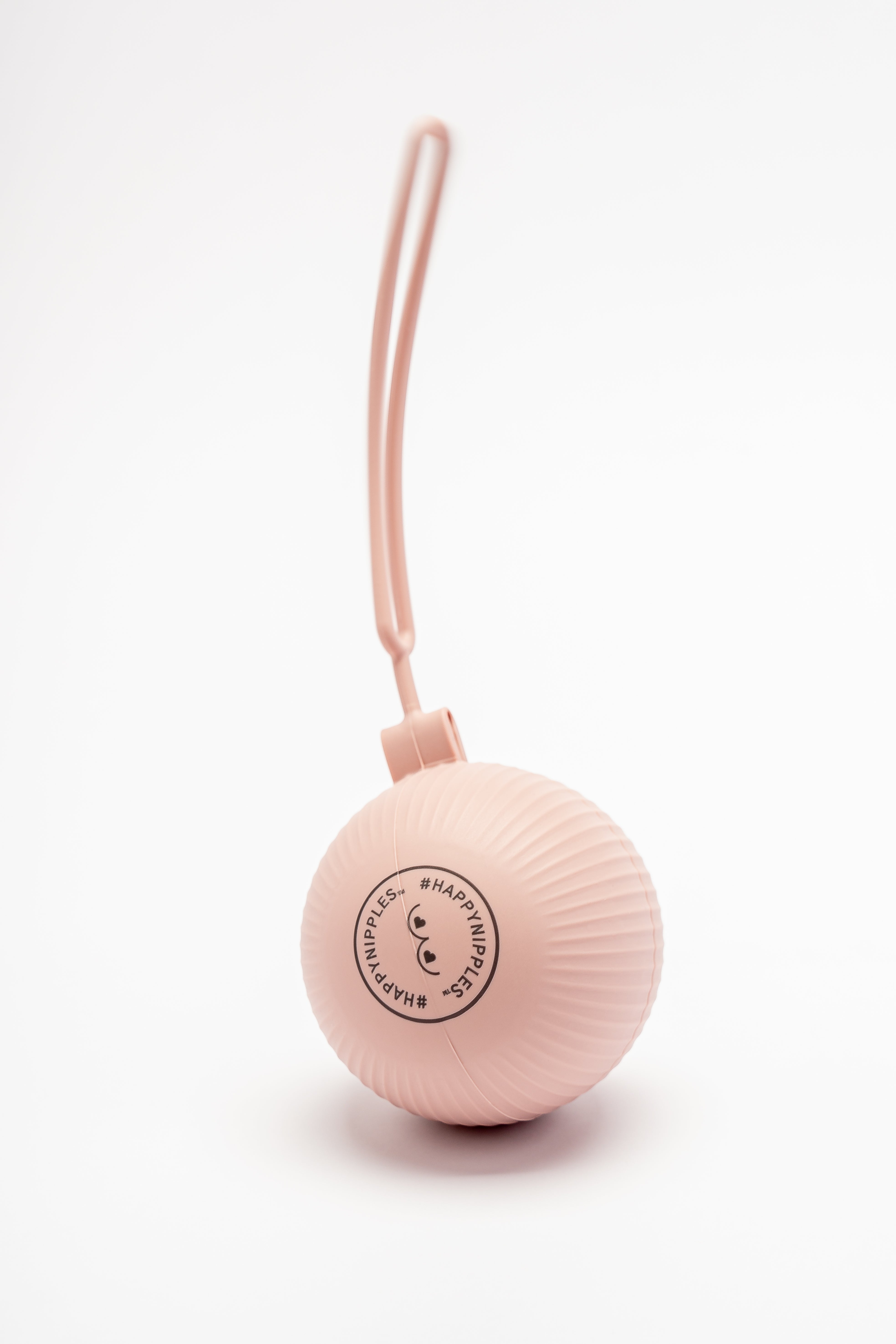 Pink silicone cup holder with travel strap for storing Silverette nursing cups